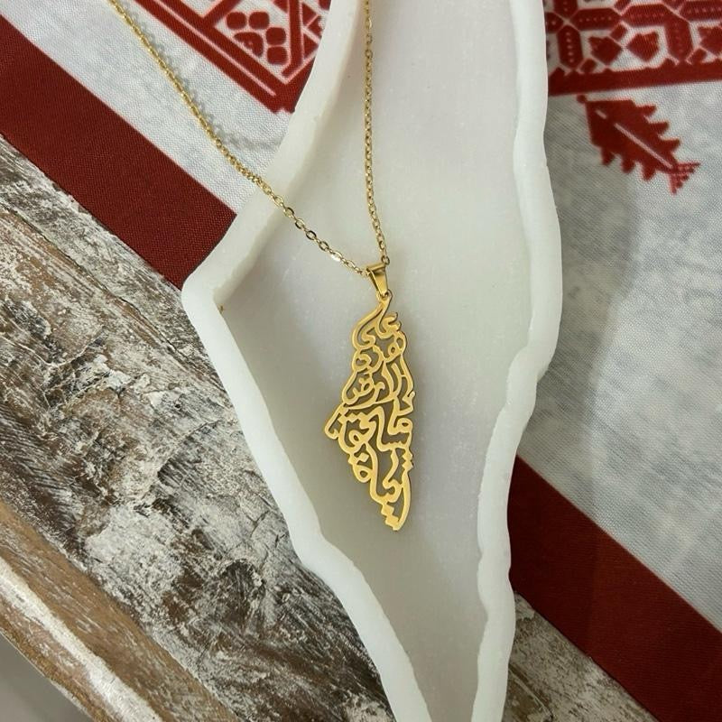 Palestine Map Necklace Engraved with Mahmoud Darwish’s iconic words: “على هذه الأرض ما يستحق الحياة” On this land, there is what deserves life - Wider