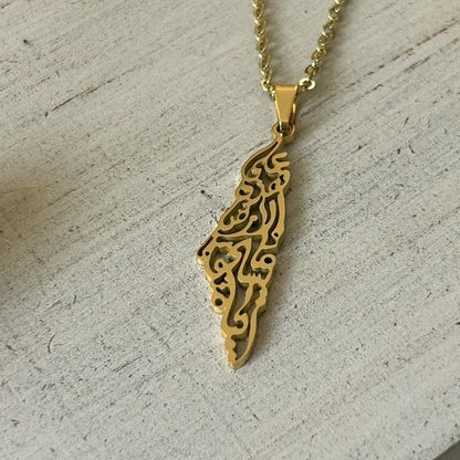 Palestine Map Necklace Engraved with Mahmoud Darwish’s iconic words: “على هذه الأرض ما يستحق الحياة” On this land, there is what deserves life