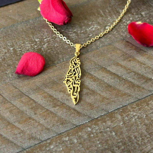 Palestine Map Necklace Engraved with Mahmoud Darwish’s iconic words: “على هذه الأرض ما يستحق الحياة” On this land, there is what deserves life